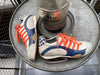 Men's Racing Sneaker in Racing Oil (Creamy White with Navy and Orange)