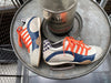 Women's Racing Sneaker in Racing Oil (Creamy White with Navy and Orange)